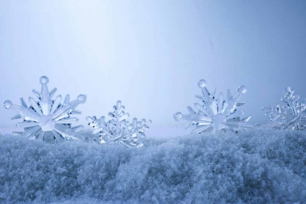 Blue Christmas snowflakes background. Winter background with snowflakes.